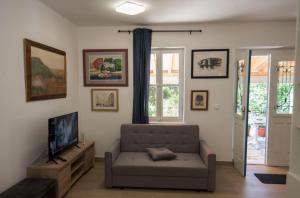 TV a/nebo společenská místnost v ubytování Studio apartman ROZA
