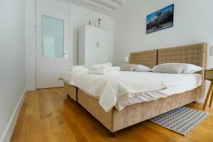 Postel nebo postele na pokoji v ubytování Aurora Apartment Zadar