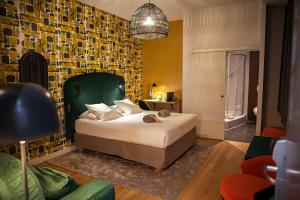 Postel nebo postele na pokoji v ubytování Hotel Kanaï