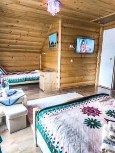 Posteľ alebo postele v izbe v ubytovaní Szostak Apartament