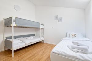 Postel nebo postele na pokoji v ubytování Apartment Familia