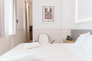 Posteľ alebo postele v izbe v ubytovaní Agora Athens Suites