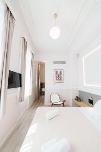 Posteľ alebo postele v izbe v ubytovaní Agora Athens Suites