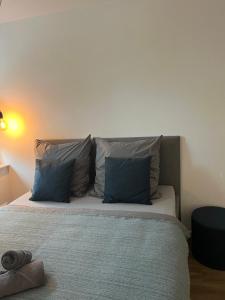 Postel nebo postele na pokoji v ubytování Apartmenthaus Stade Schwingewiesen Apartment 6