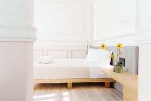 Posteľ alebo postele v izbe v ubytovaní Agora Athens Suites
