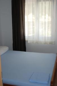 Posteľ alebo postele v izbe v ubytovaní Olive tree apartment + 3 fotografie