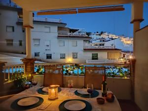 En balkon eller terrasse på Apartamento Oasis La Herradura