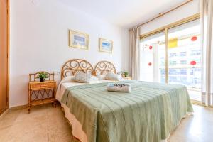 Postel nebo postele na pokoji v ubytování Apartamentos Michelangelo Arysal