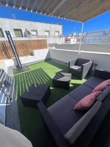Posedenie v ubytovaní GATU PREMIUM Villa Galeona, con terraza chillout privada