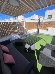 Posedenie v ubytovaní GATU PREMIUM Villa Galeona, con terraza chillout privada