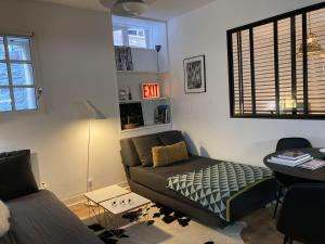 Posedenie v ubytovaní Le Cosy Intra - Appt Cocon Parking privé