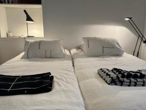 Posteľ alebo postele v izbe v ubytovaní Le Cosy Intra - Appt Cocon Parking privé