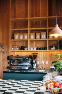 a kitchen with wooden cabinets and a stove top oven at Apres Whitefish in Whitefish