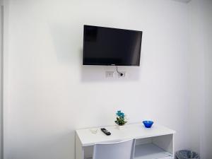 TV a/nebo společenská místnost v ubytování biRose B&B Affittacamere