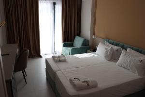 Postel nebo postele na pokoji v ubytování Delight Hotel & SPA
