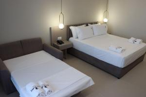 Postel nebo postele na pokoji v ubytování Delight Hotel & SPA