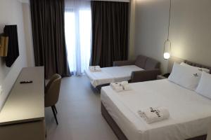 Postel nebo postele na pokoji v ubytování Delight Hotel & SPA