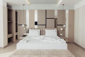 Postel nebo postele na pokoji v ubytování Delight Hotel & SPA