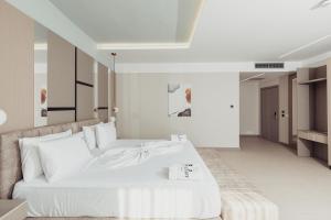 Postel nebo postele na pokoji v ubytování Delight Hotel & SPA