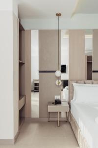 Postel nebo postele na pokoji v ubytování Delight Hotel & SPA