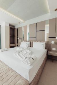 Postel nebo postele na pokoji v ubytování Delight Hotel & SPA