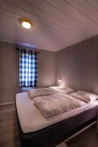 Postel nebo postele na pokoji v ubytování Beitostølen Resort Hytter