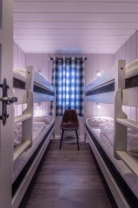 Postel nebo postele na pokoji v ubytování Beitostølen Resort Hytter