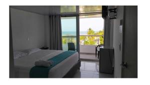 Postelja oz. postelje v sobi nastanitve Sky view hotel tolu