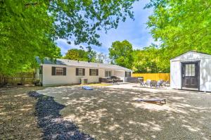 a home with a large yard with a shed at New Braunfels Haven with Hot Tub and Fire Pit! in New Braunfels