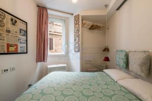 Posteľ alebo postele v izbe v ubytovaní Cozy Entire Apt Close to Piazza Trilussa