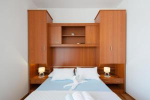 Postel nebo postele na pokoji v ubytování Guesthouse Sanela
