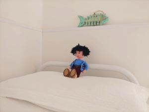 Postel nebo postele na pokoji v ubytování Le Petit Hotel