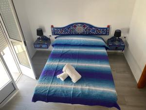 Posteľ alebo postele v izbe v ubytovaní Casa Salma