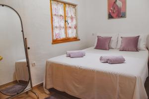 Postel nebo postele na pokoji v ubytování Mobile Homes Bilice