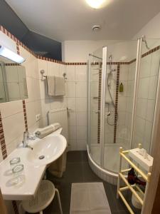 Koupelna v ubytování Privatzimmer und Ferienwohnungen Leeb