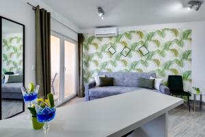 Posezení v ubytování Oliva Vallis Apartments + 37 fotografií