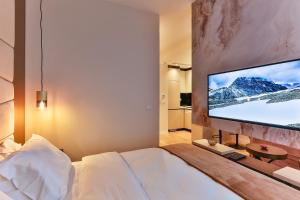 TV a/nebo společenská místnost v ubytování La Fiaba Rafailovici Apartment