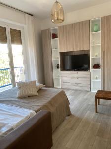 Posteľ alebo postele v izbe v ubytovaní Casa Belinda