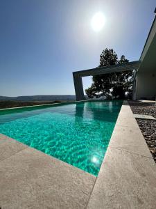 Der Swimmingpool an oder in der Nähe von Villa Mona ,heated swimming pool