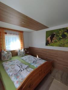 Postel nebo postele na pokoji v ubytování Mooslechnerhof