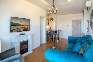 Televízia a/alebo spoločenská miestnosť v ubytovaní Morska vila 6 Luxury Apartment Žnjan