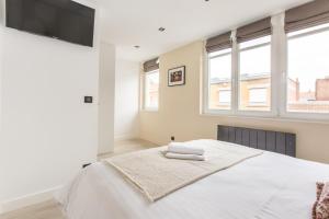 Posteľ alebo postele v izbe v ubytovaní Appartement spacieux et moderne 4 chambres à 5mn à pieds République