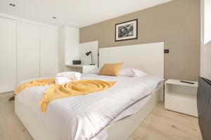 Posteľ alebo postele v izbe v ubytovaní Appartement spacieux et moderne 4 chambres à 5mn à pieds République