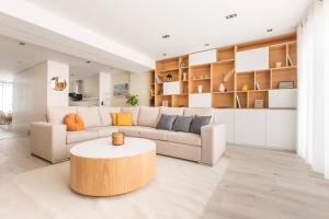 Posedenie v ubytovaní Appartement spacieux et moderne 4 chambres à 5mn à pieds République