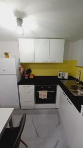 Kuchyň nebo kuchyňský kout v ubytování Apartma ŠPANO