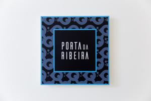 a black and white card with the wordsporina an africa at Atrium Areias in Viana do Castelo