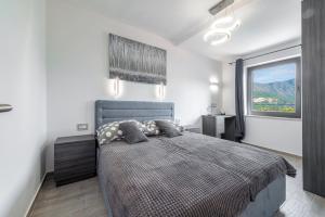 Katil atau katil-katil dalam bilik di Paladium Exclusive Apartment