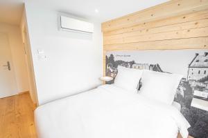 Voodi või voodid majutusasutuse Esplanade Hotel toas