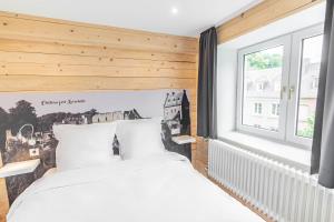 Voodi või voodid majutusasutuse Esplanade Hotel toas