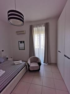 Posteľ alebo postele v izbe v ubytovaní Casa Landolina Noto